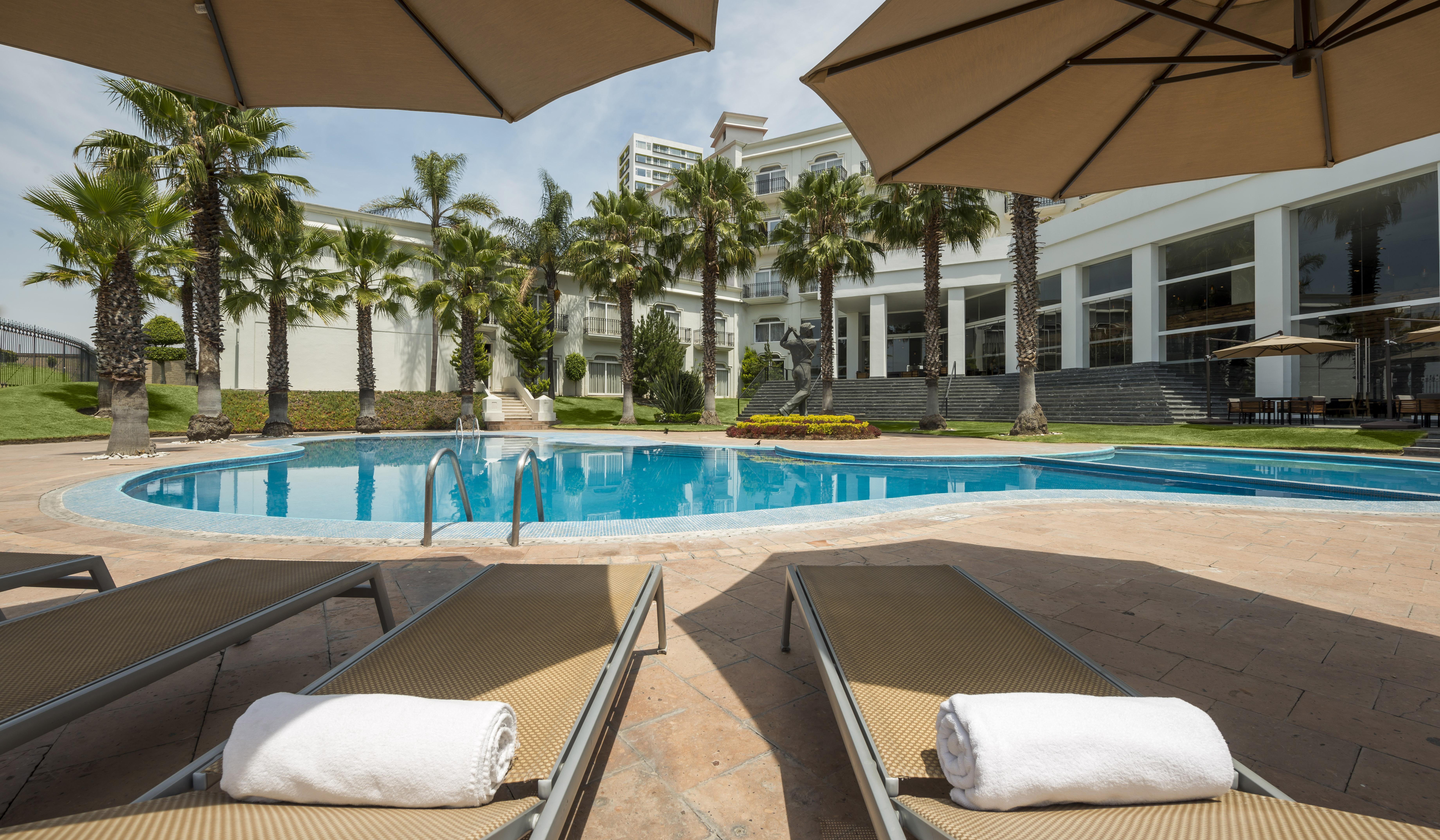מלון Camino Real Puebla Angelopolis מראה חיצוני תמונה Pool at the hotel